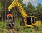 New Swing Machine picking up logs,Side of new Komatsu Swing Machine